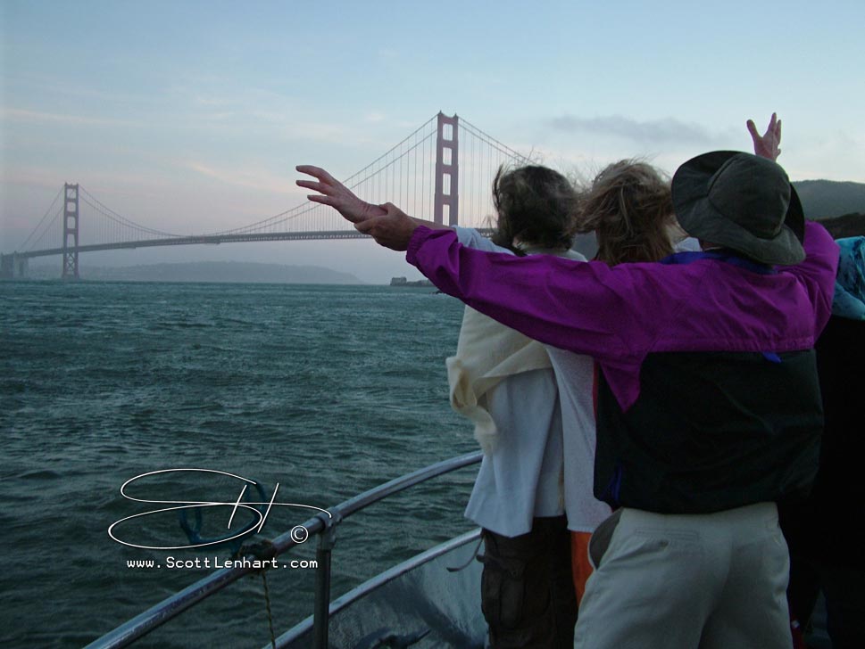 birthday party boats travel underneath the golden gate bridge
